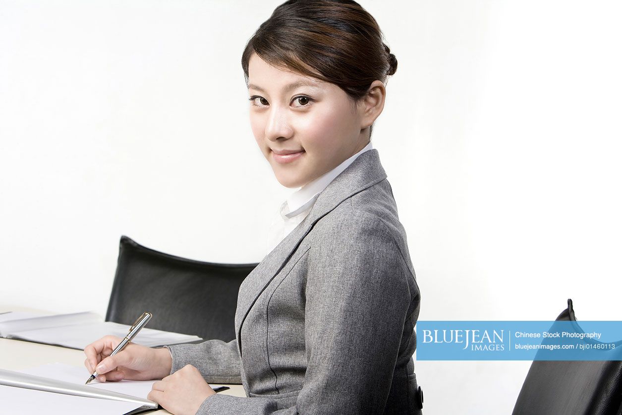 Chinese businesswoman in office