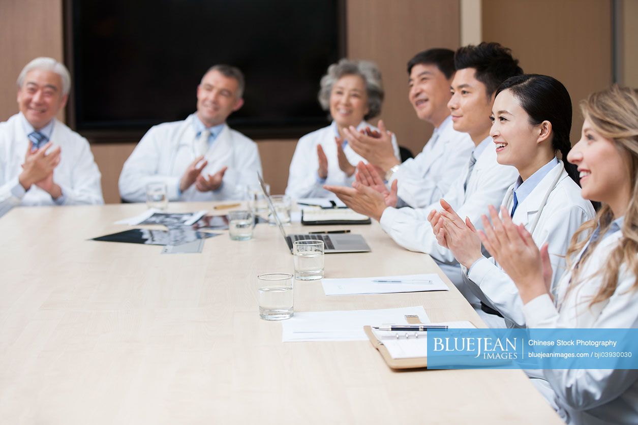 Medical experts clapping