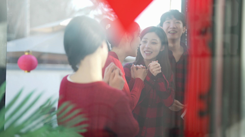 Young friends celebrating Chinese New Year together
