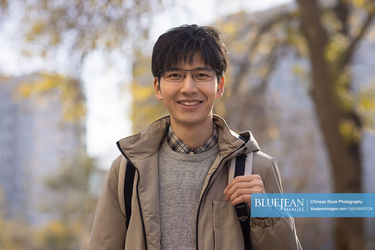 Portrait of cheerful Chinese college student