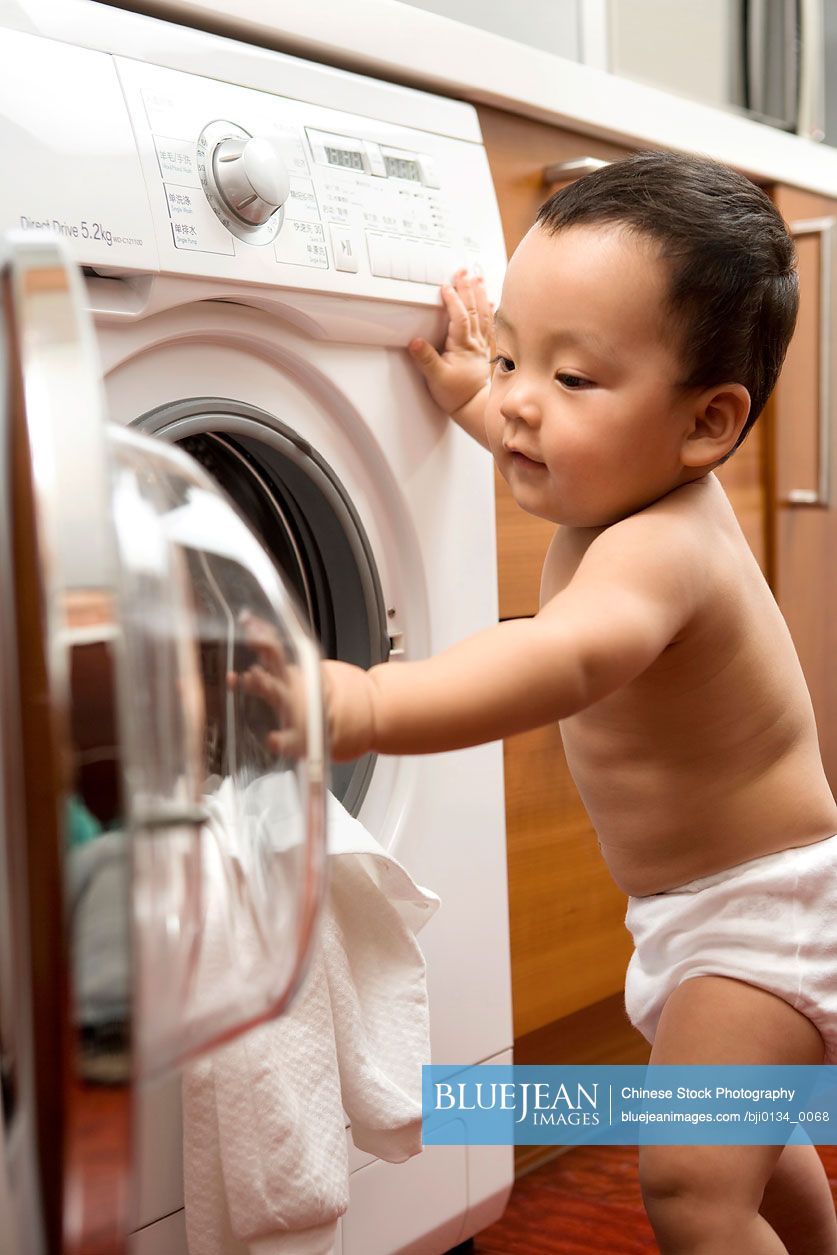 Chinese infant with washing machine