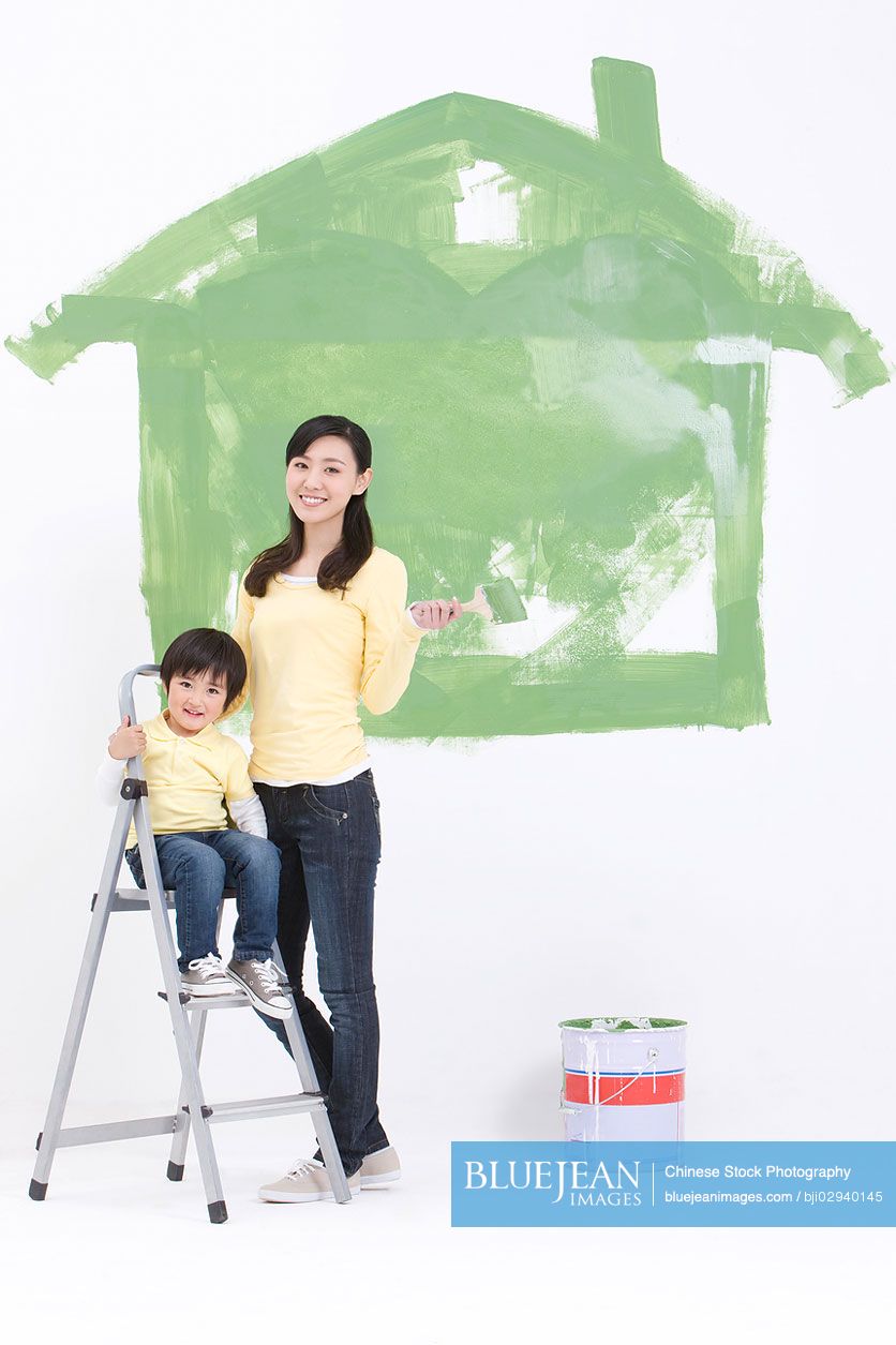 Chinese mother and son doing diy home improvement