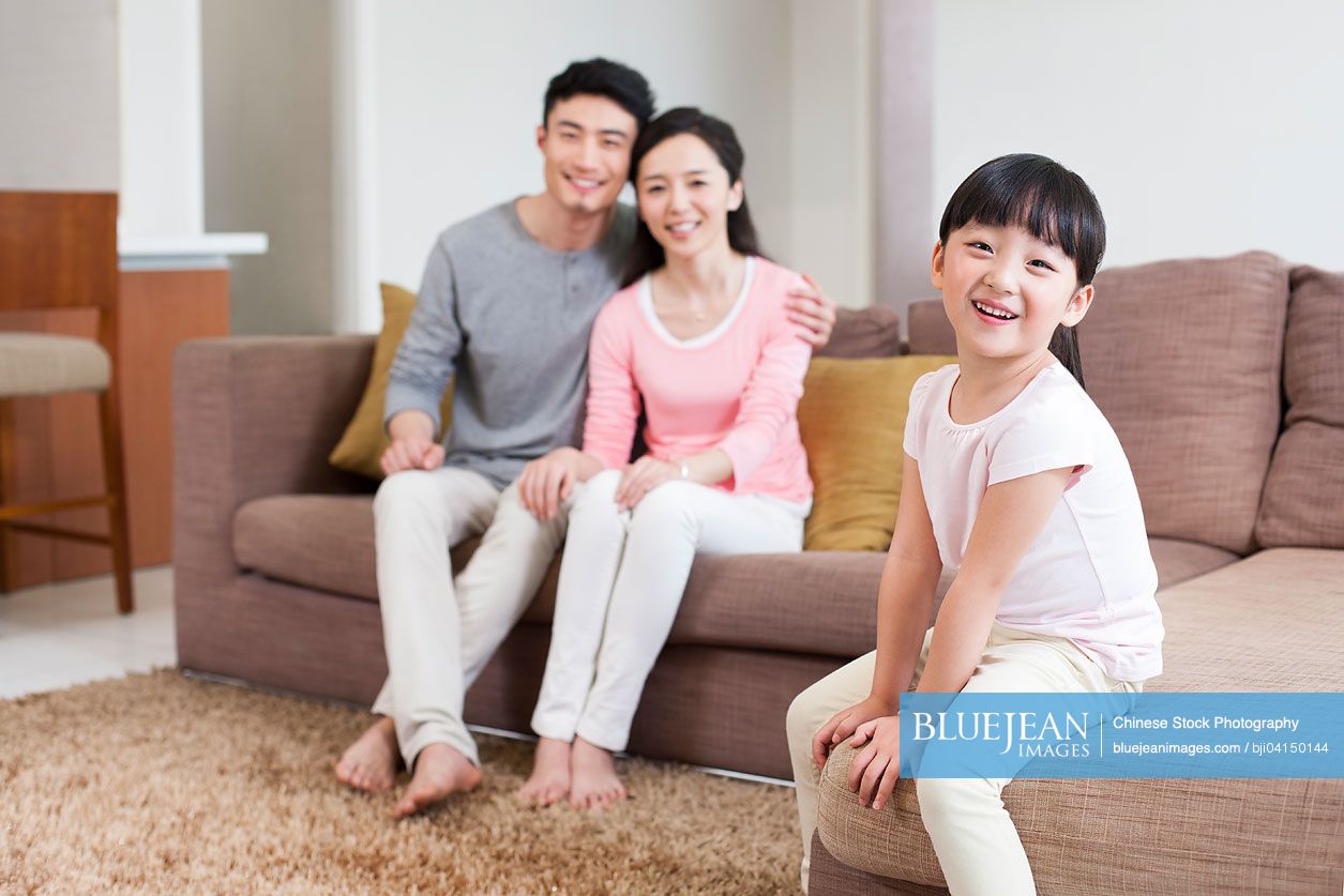 Portrait of Chinese happy family at home