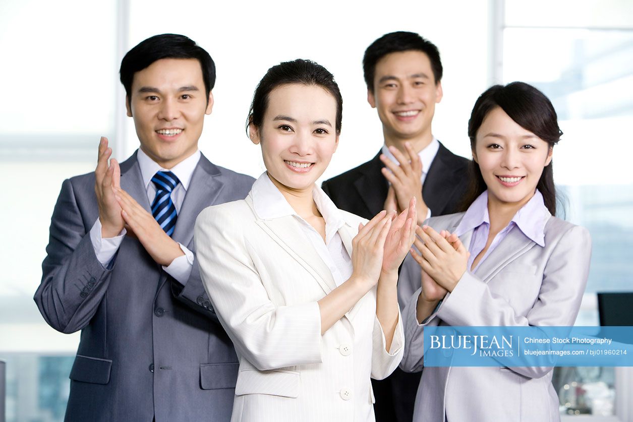 Cheering Chinese office workers