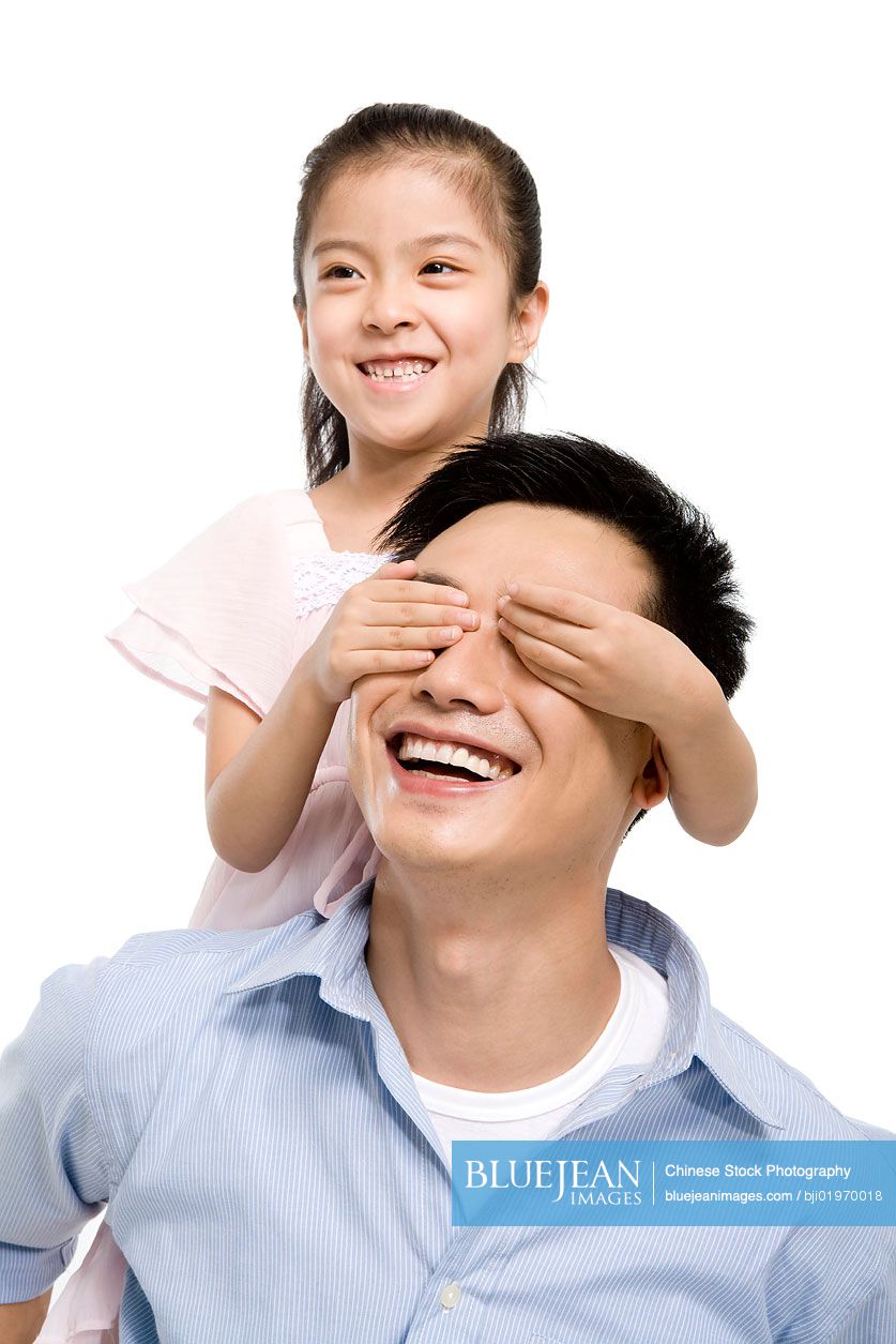 Chinese father and daughter playing