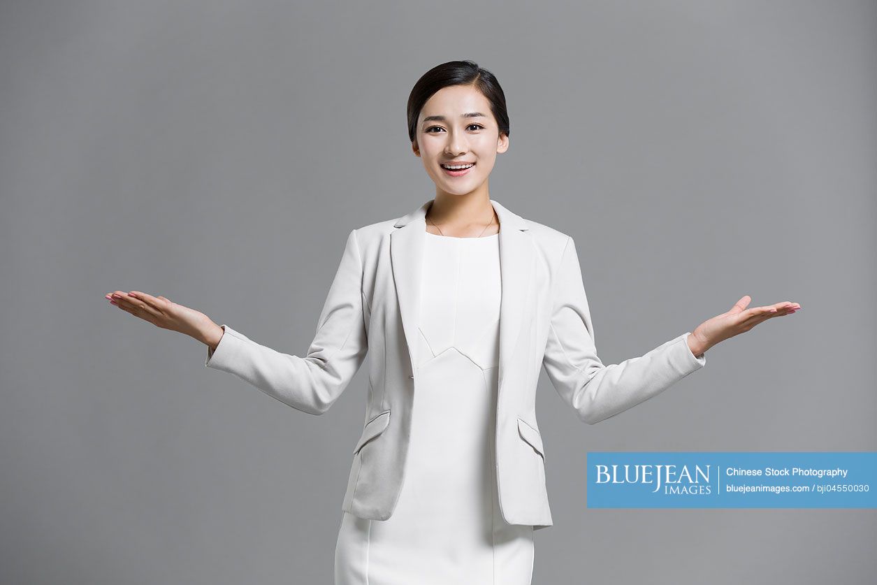 Happy young Chinese businesswoman