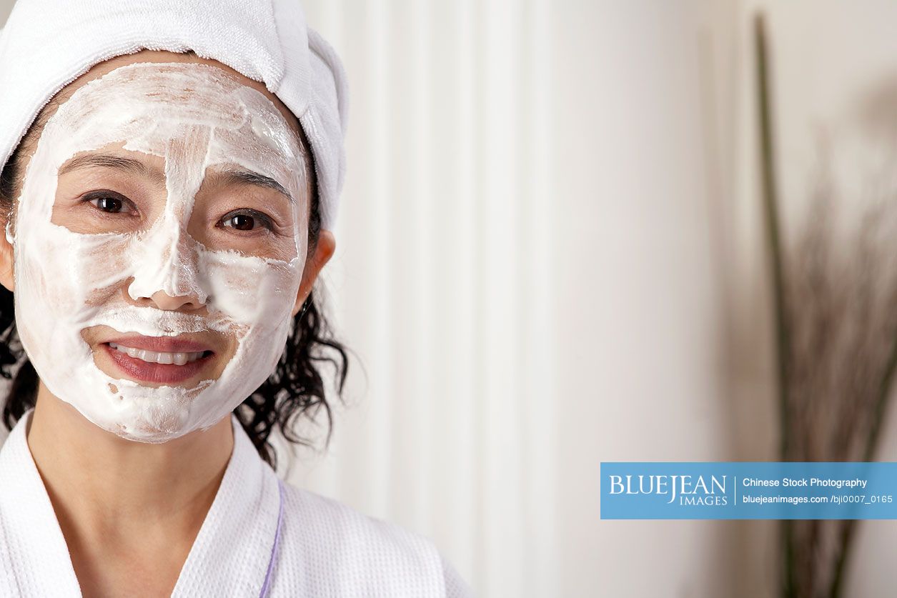 Chinese Woman With A White Facial Mask