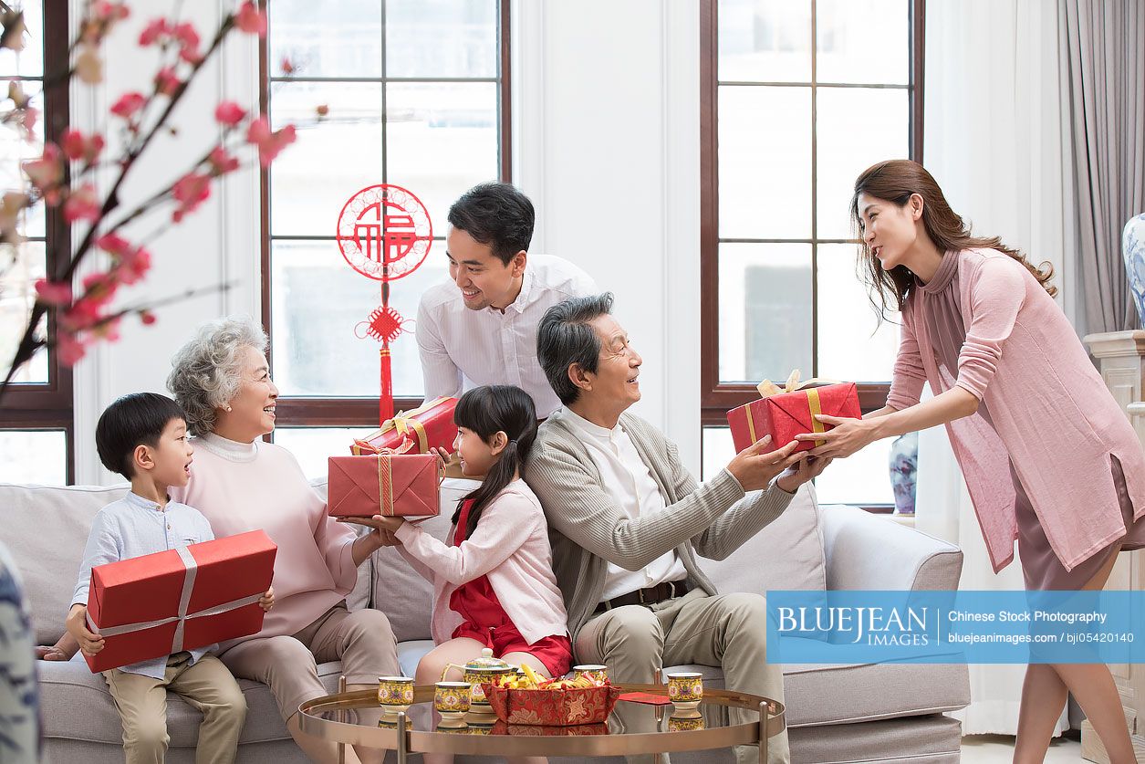 Family visiting with gifts during Chinese New Year