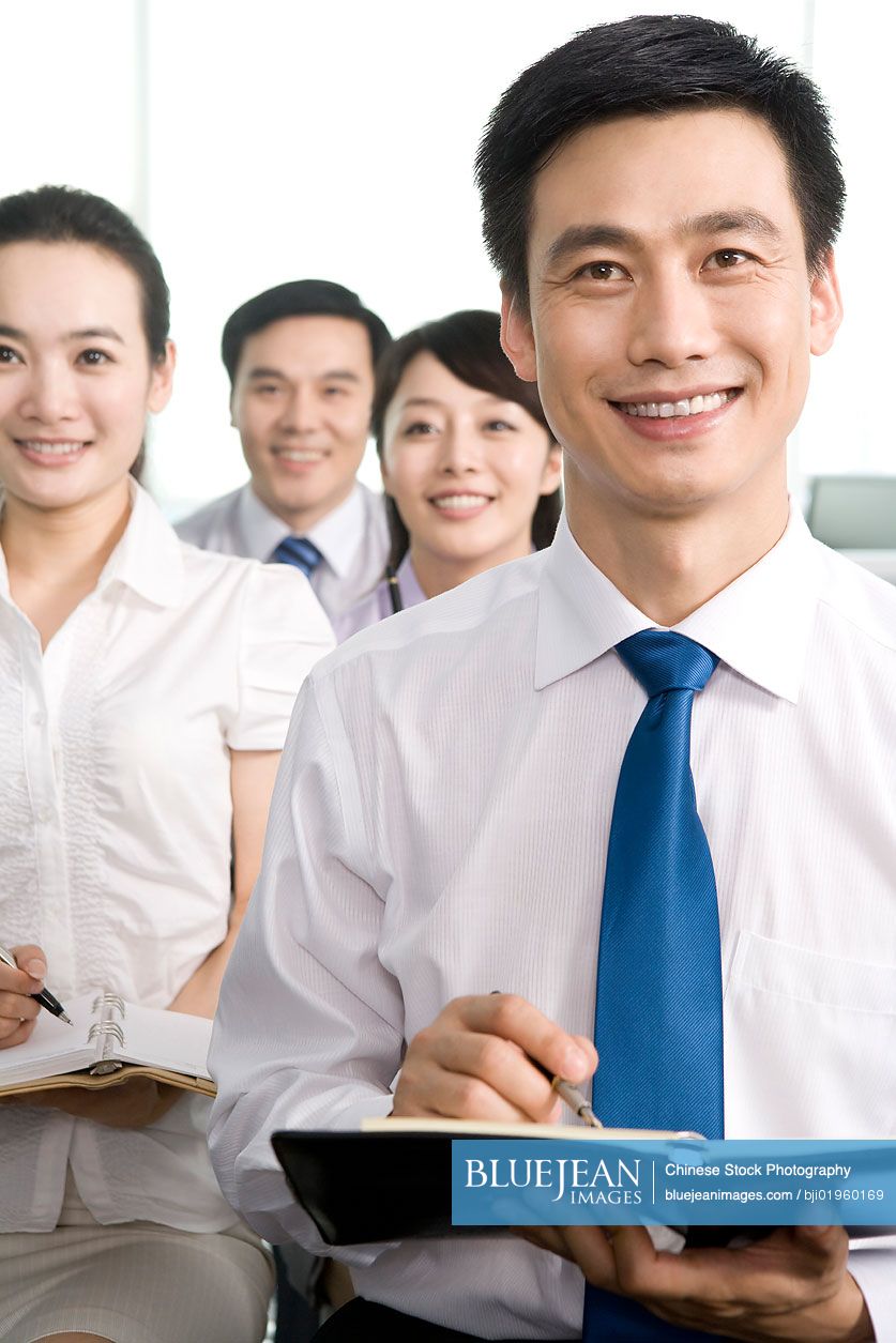 Chinese people meeting at the office