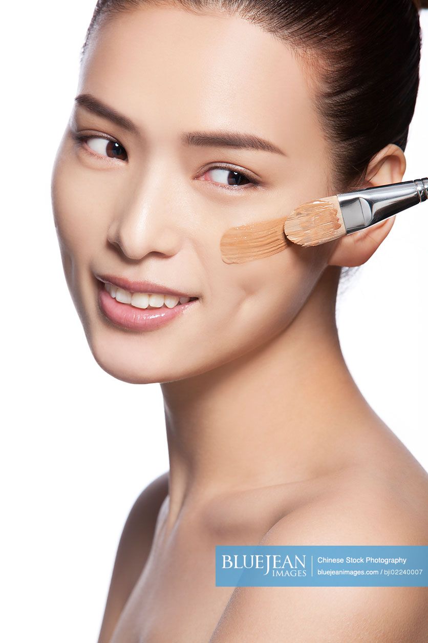 Headshot of young beautiful Chinese woman