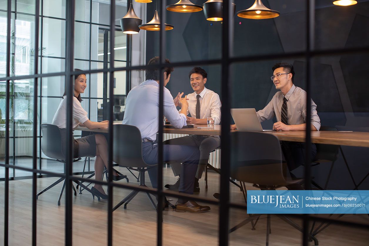 Chinese business people having a meeting in office