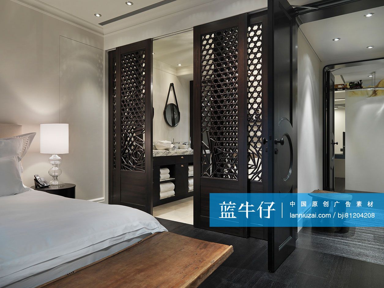 View of bathroom through the bedroom at home