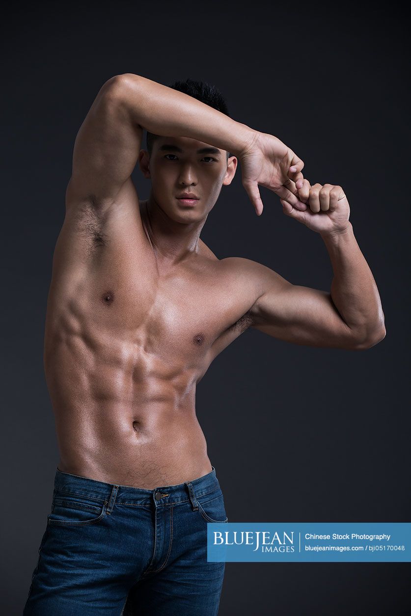 Portrait of young Chinese muscular man
