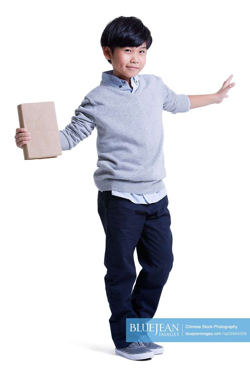 Trendy Chinese boy with book