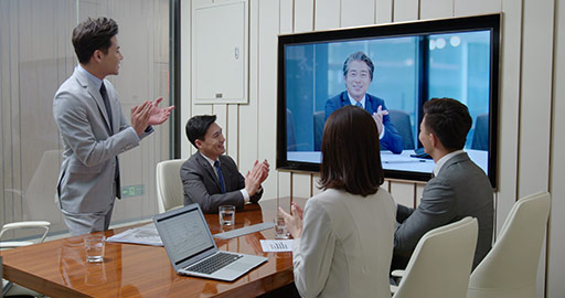 Confident Chinese business people having video conference,4K