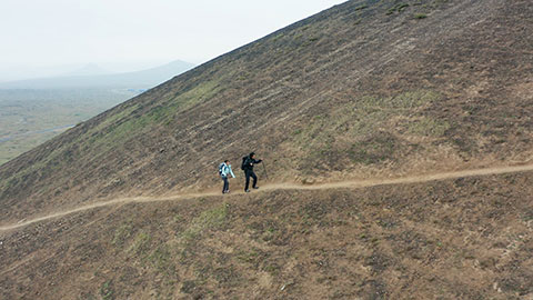 Happy Chinese couple hiking outdoors,4K