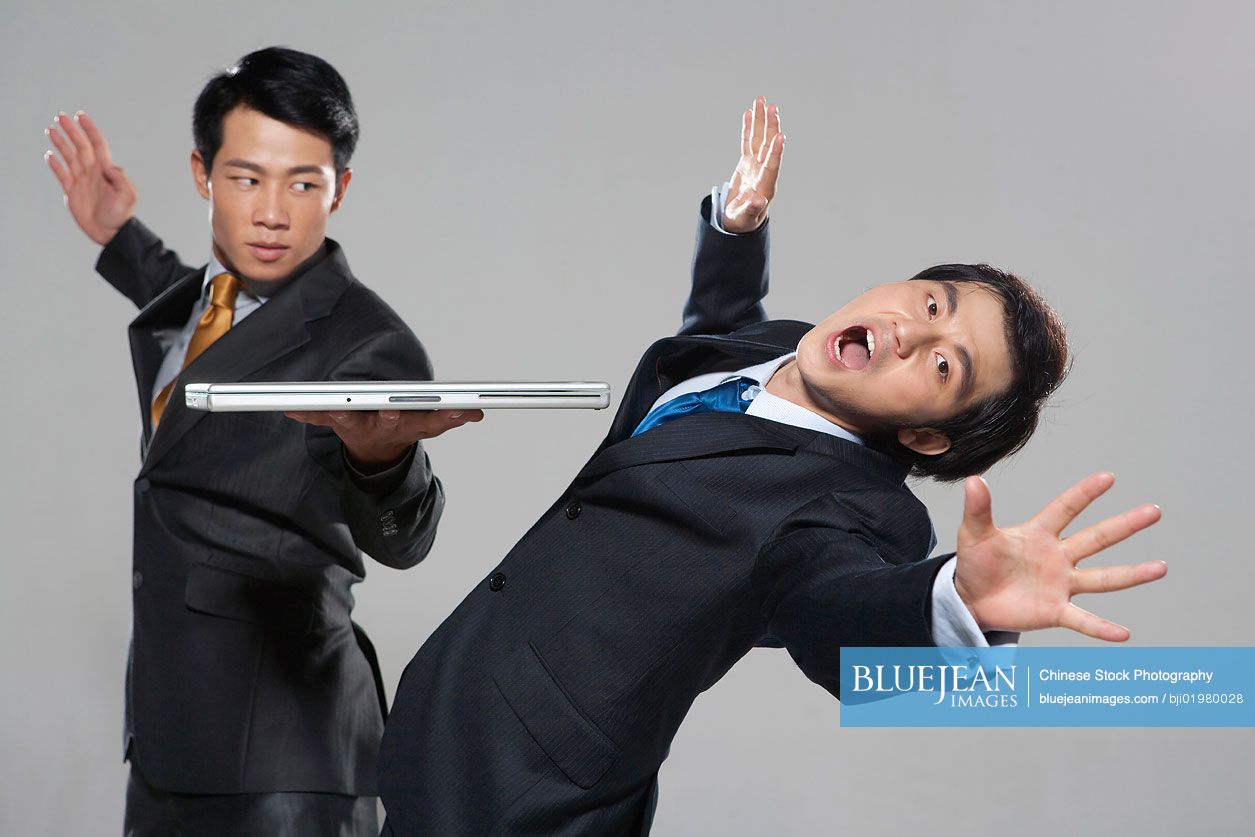 Two Chinese businessmen fighting