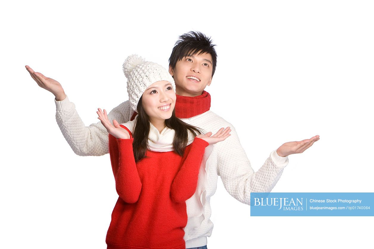 Young Chinese couple in winter clothes