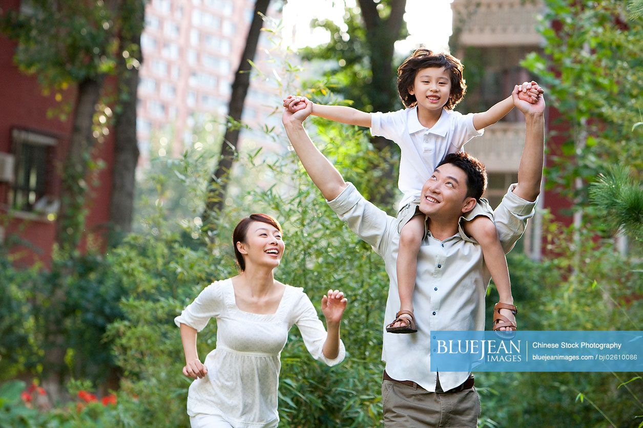 Chinese family having fun in a common community