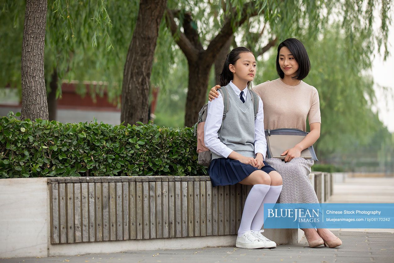 Chinese teacher consoling student