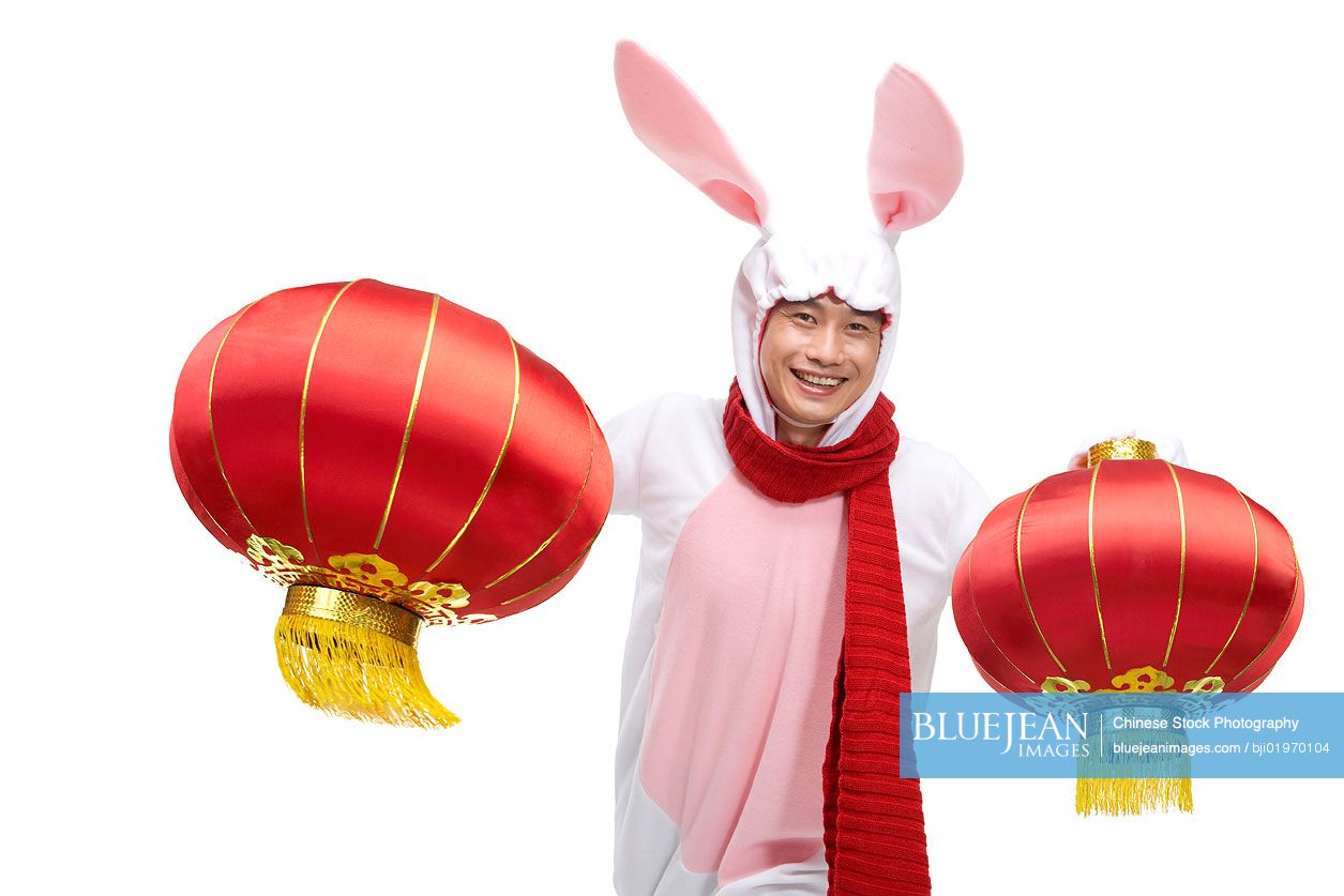 Mid-adult Chinese man celebrating the Year of the Rabbit