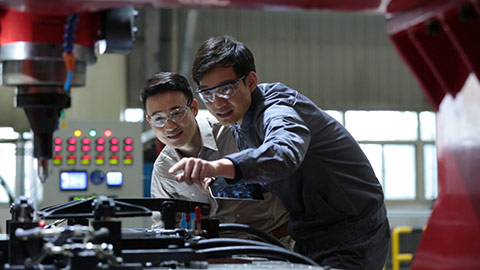 Chinese engineers working in factory,HD
