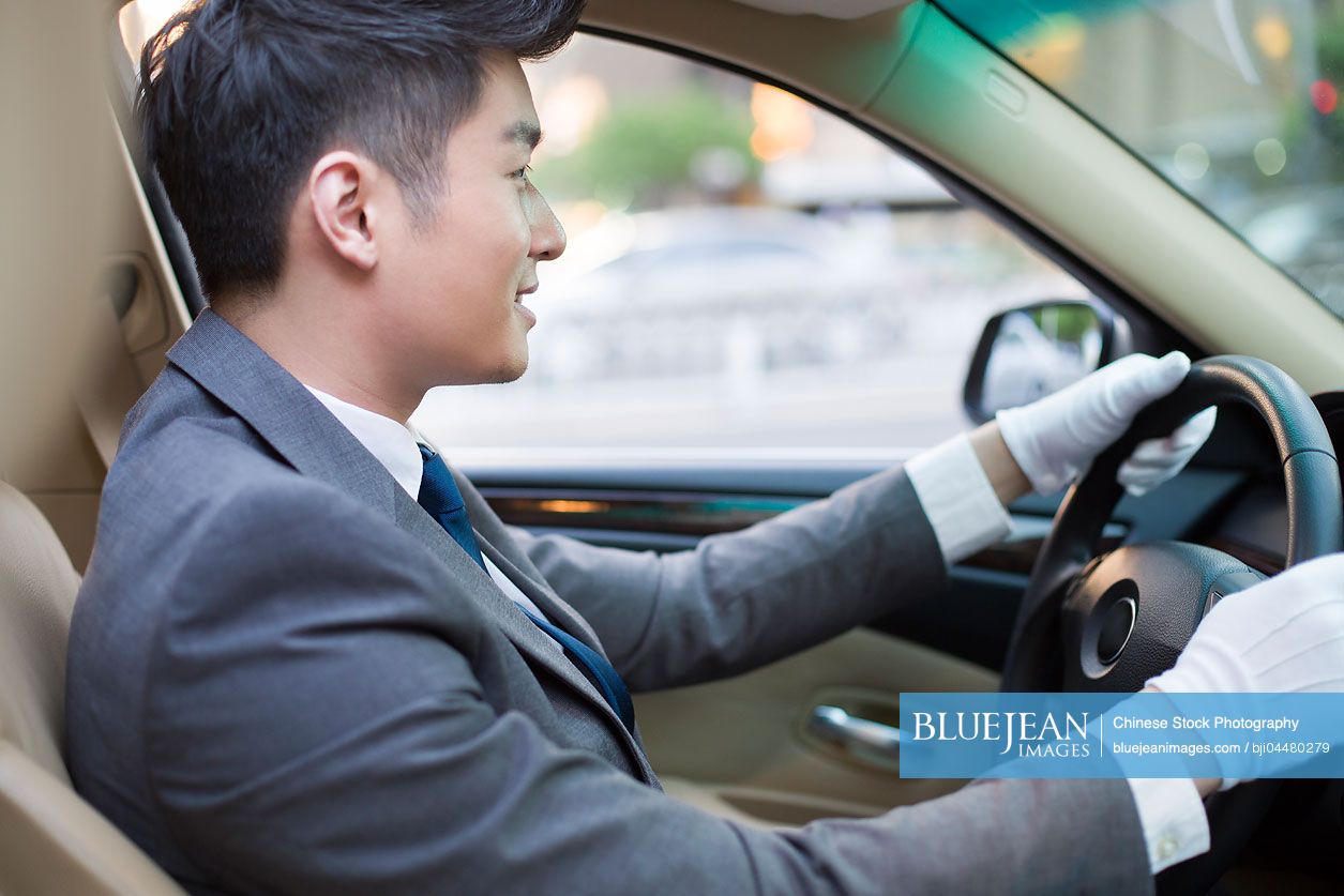 Chinese chauffeur driving car