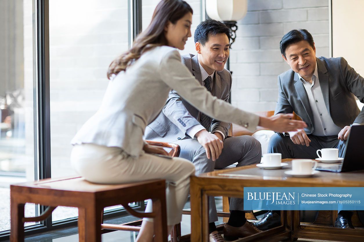 Chinese business people having a meeting