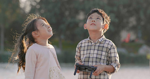 Happy Chinese children playing with remote control toy,4K