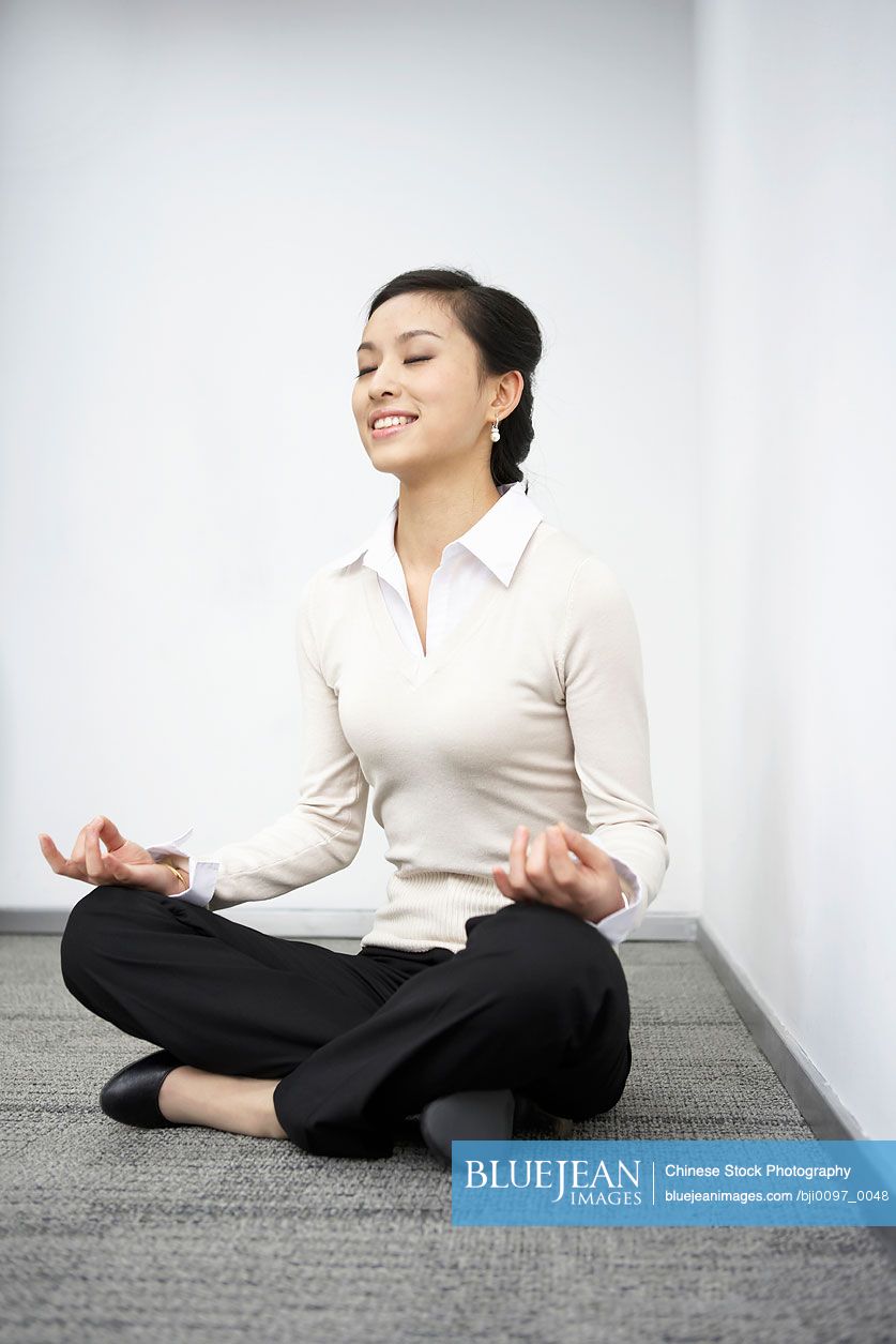 Chinese Businesswoman Meditating