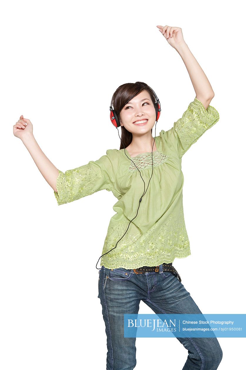Portrait of young Chinese woman with headphones