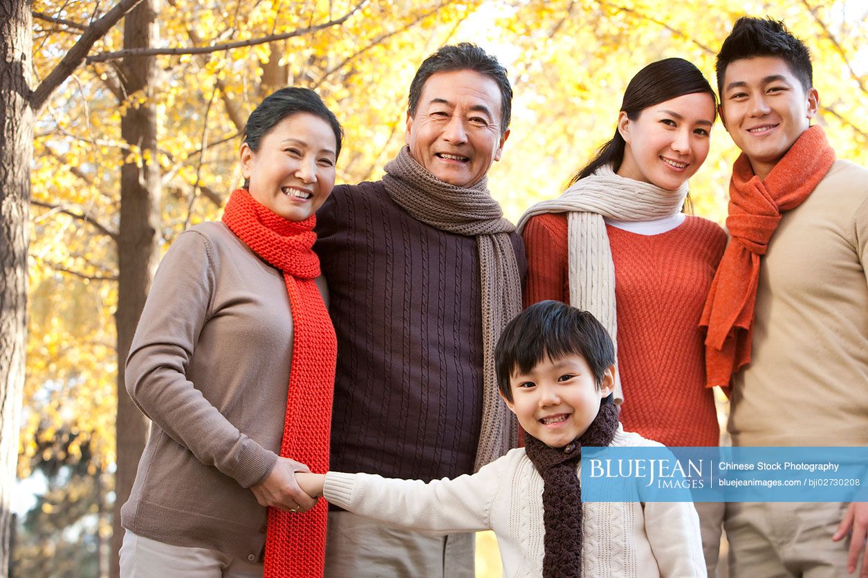 Outdoor Chinese family portrait in autumn