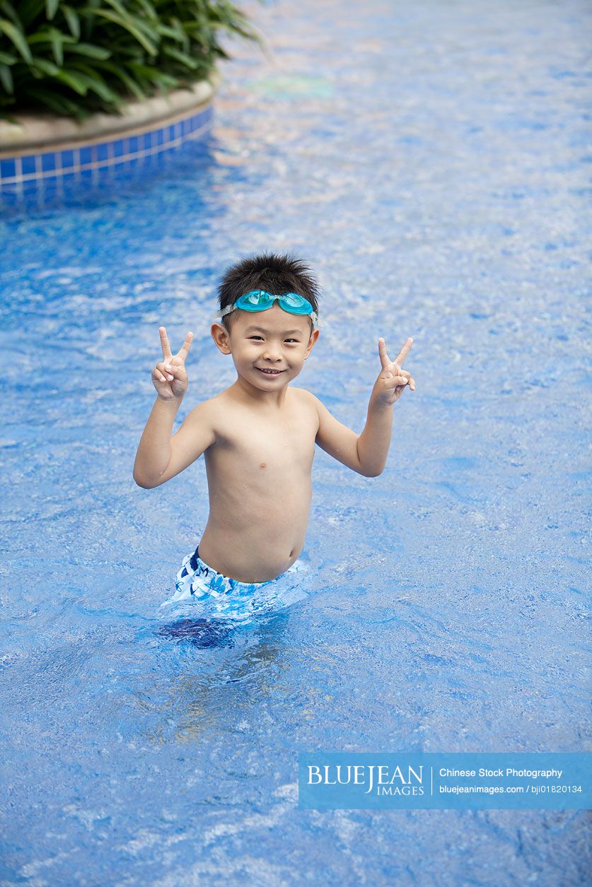 Portrait of an excited Chinese boy on vacation