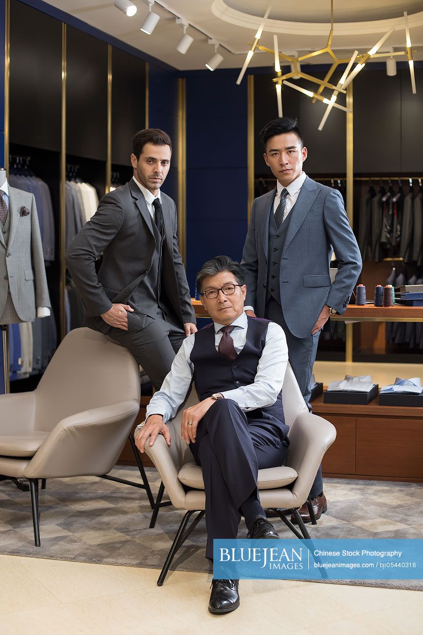 Confident Chinese fashion designer and businessmen