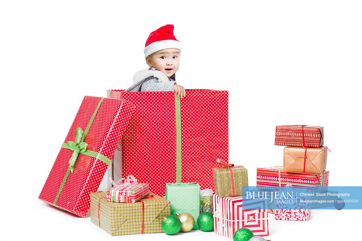 Cute Chinese baby in Christmas gift boxHighres stock photo for download