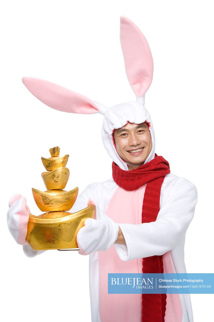 Mid-adult Chinese man celebrating the Year of the Rabbit