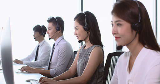 Chinese call center agents working in office,4K