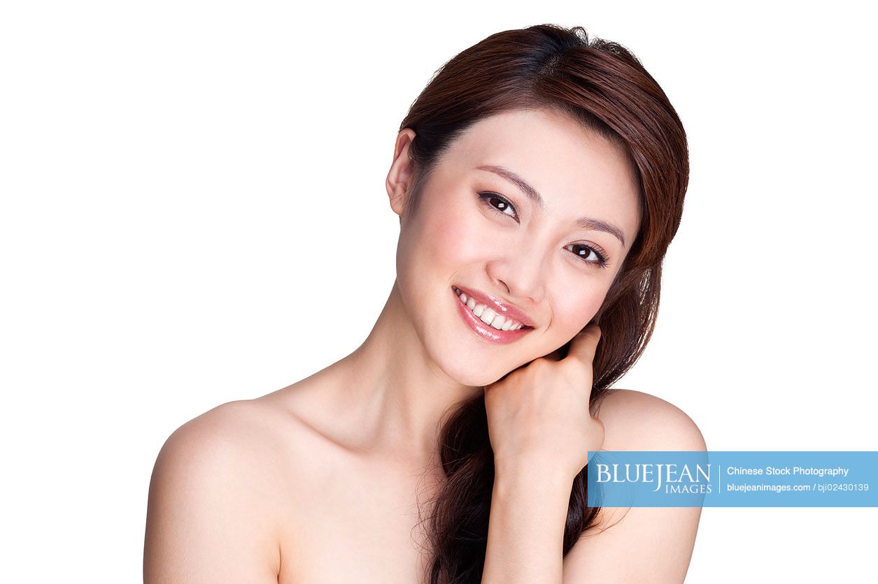 Portrait of a happy beautiful young Chinese woman