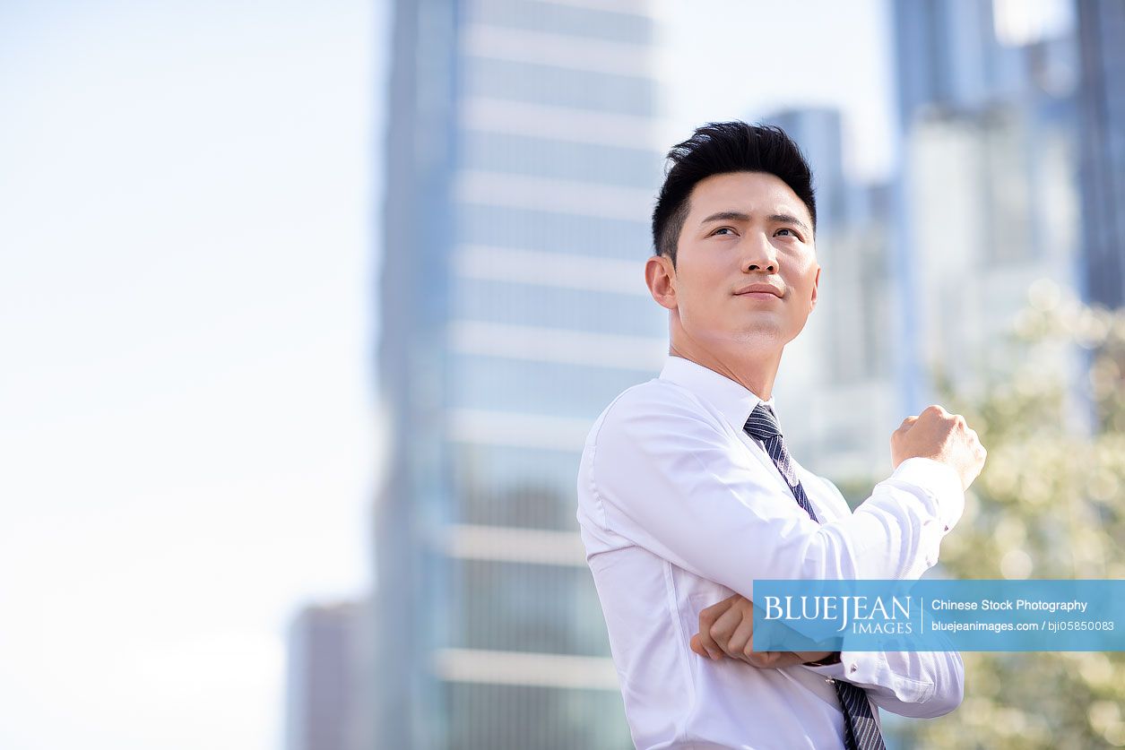 Confident young Chinese businessman