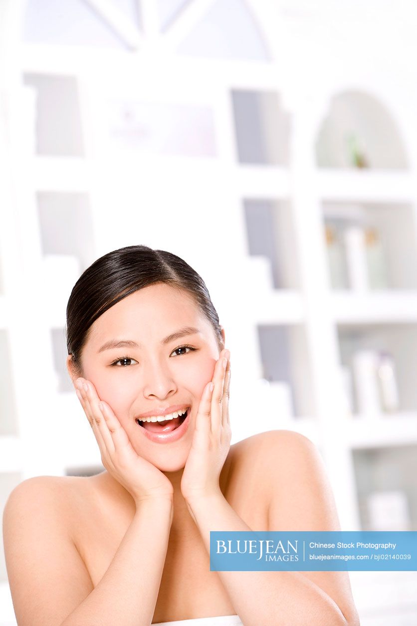 Beauty shot of an excited young Chinese woman