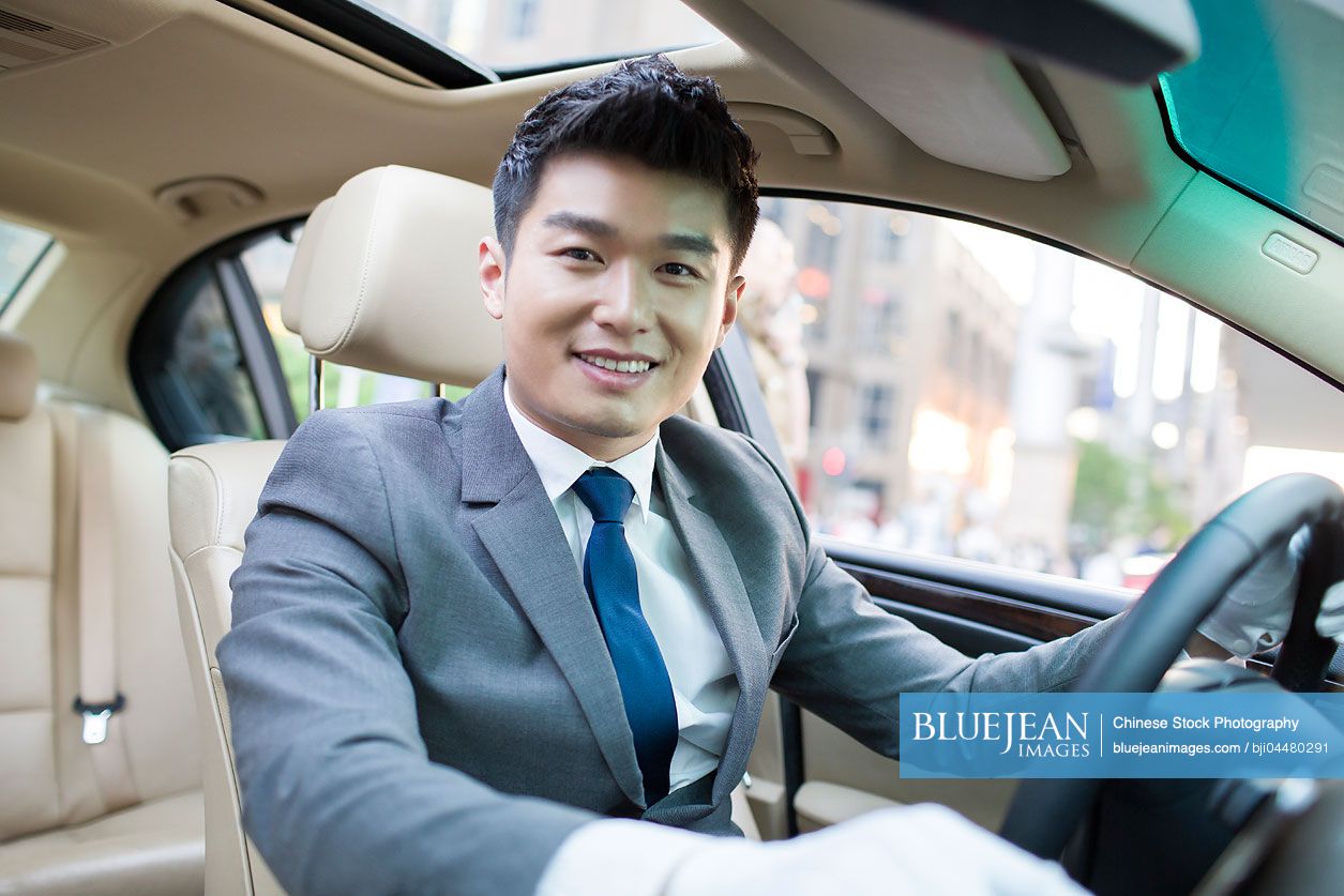 Chinese chauffeur driving car
