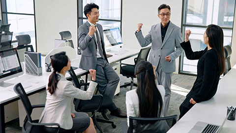 Confident Chinese business people having a meeting