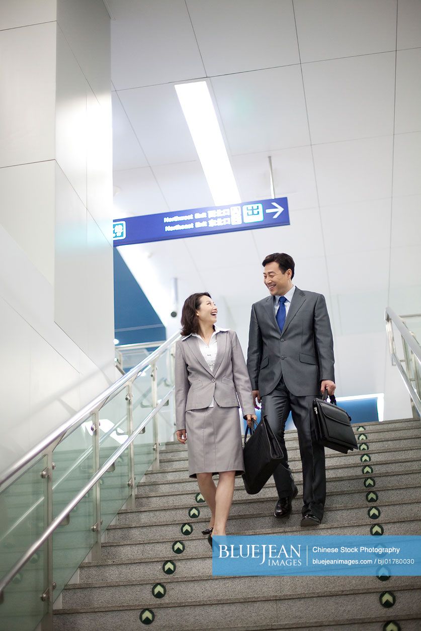 Chinese businesspeople commuting