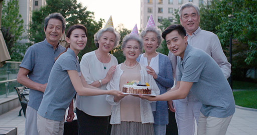 Young Chinese nurse assistants celebrating birthday with seniors,4K