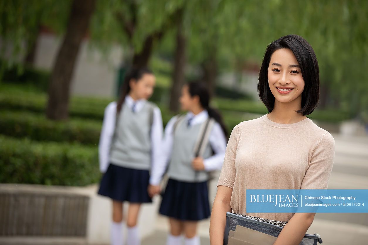 Chinese teacher and students on campus