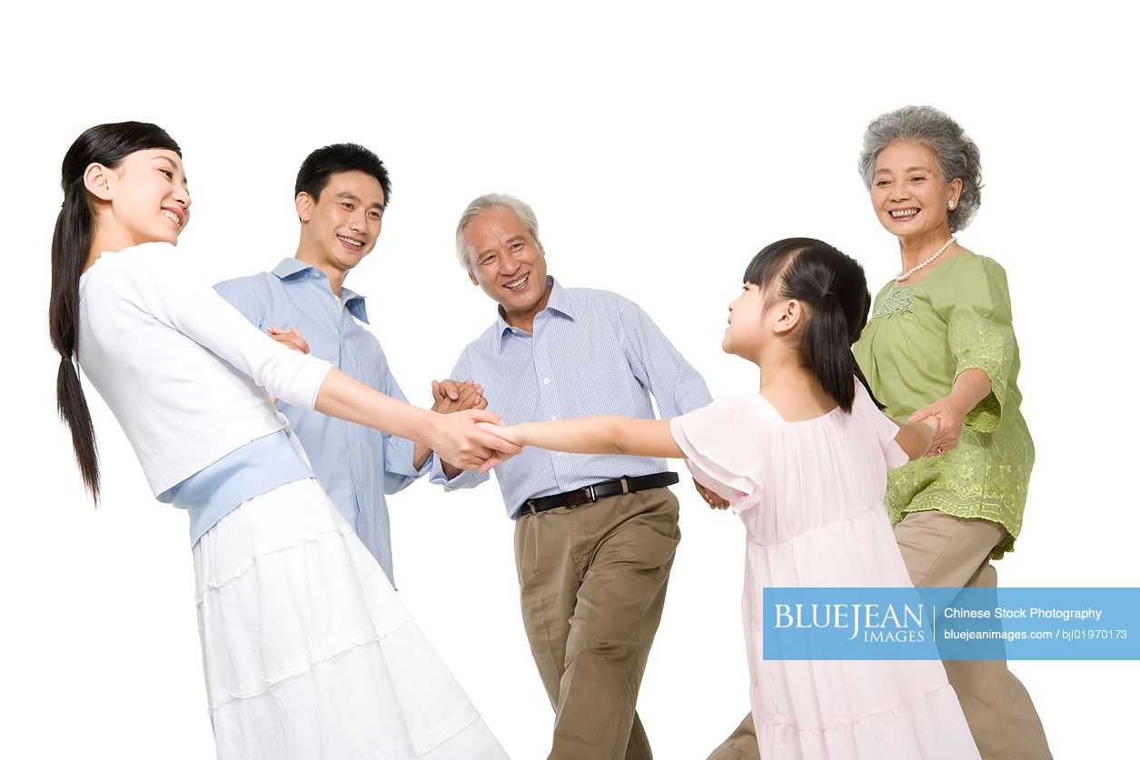 Chinese family in a circle holding hands