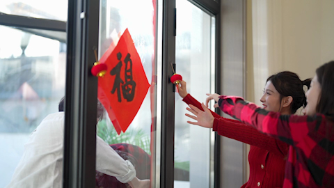 Young friends celebrating Chinese New Year together