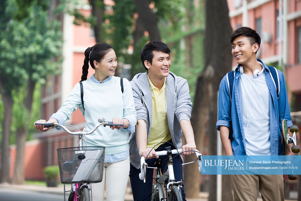 Happy Chinese college students on campus