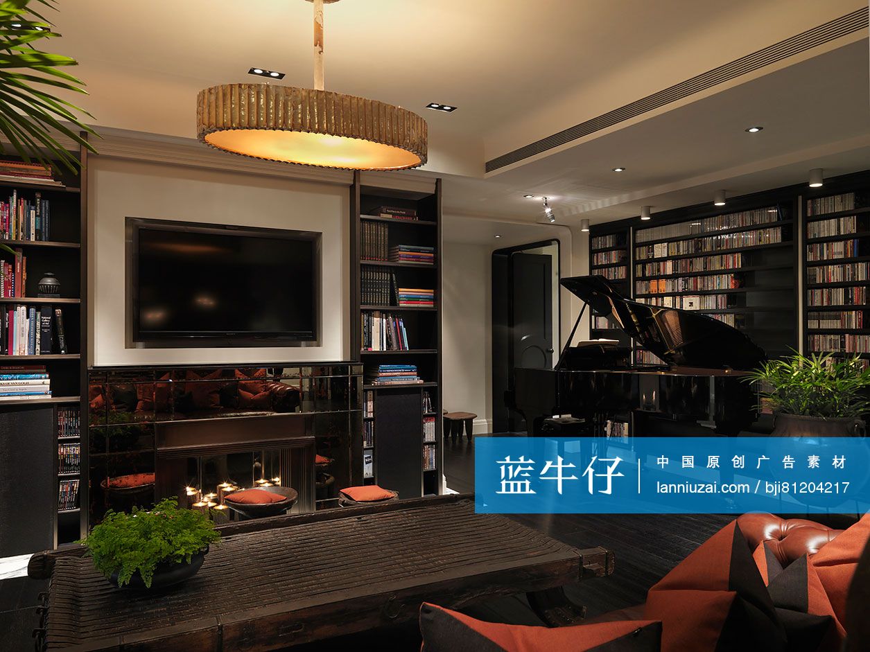 Living room with bookshelves; TV and piano at home-蓝牛仔影像-中国原创广告影像素材