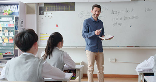 Young foreign teacher teaching a class,4K